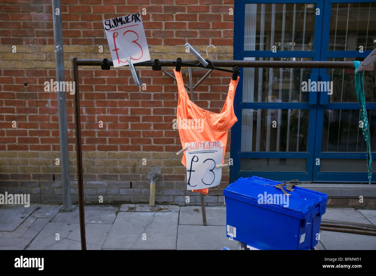 a swimsuit for sale at brick lane market in east london Stock Photo Alamy