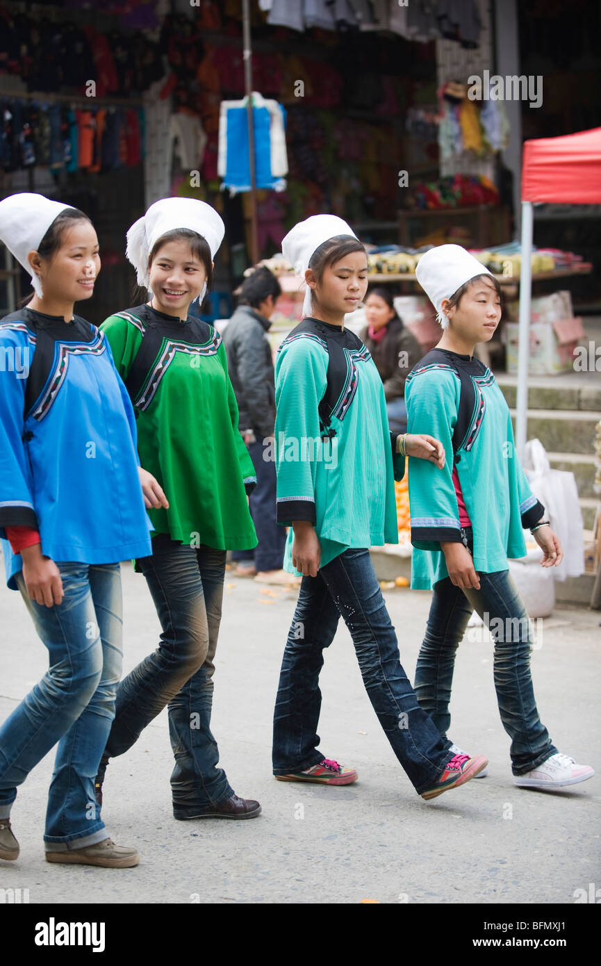 China, Guizhou Province, Xinhua, Shui girls at weekly market Stock Photo