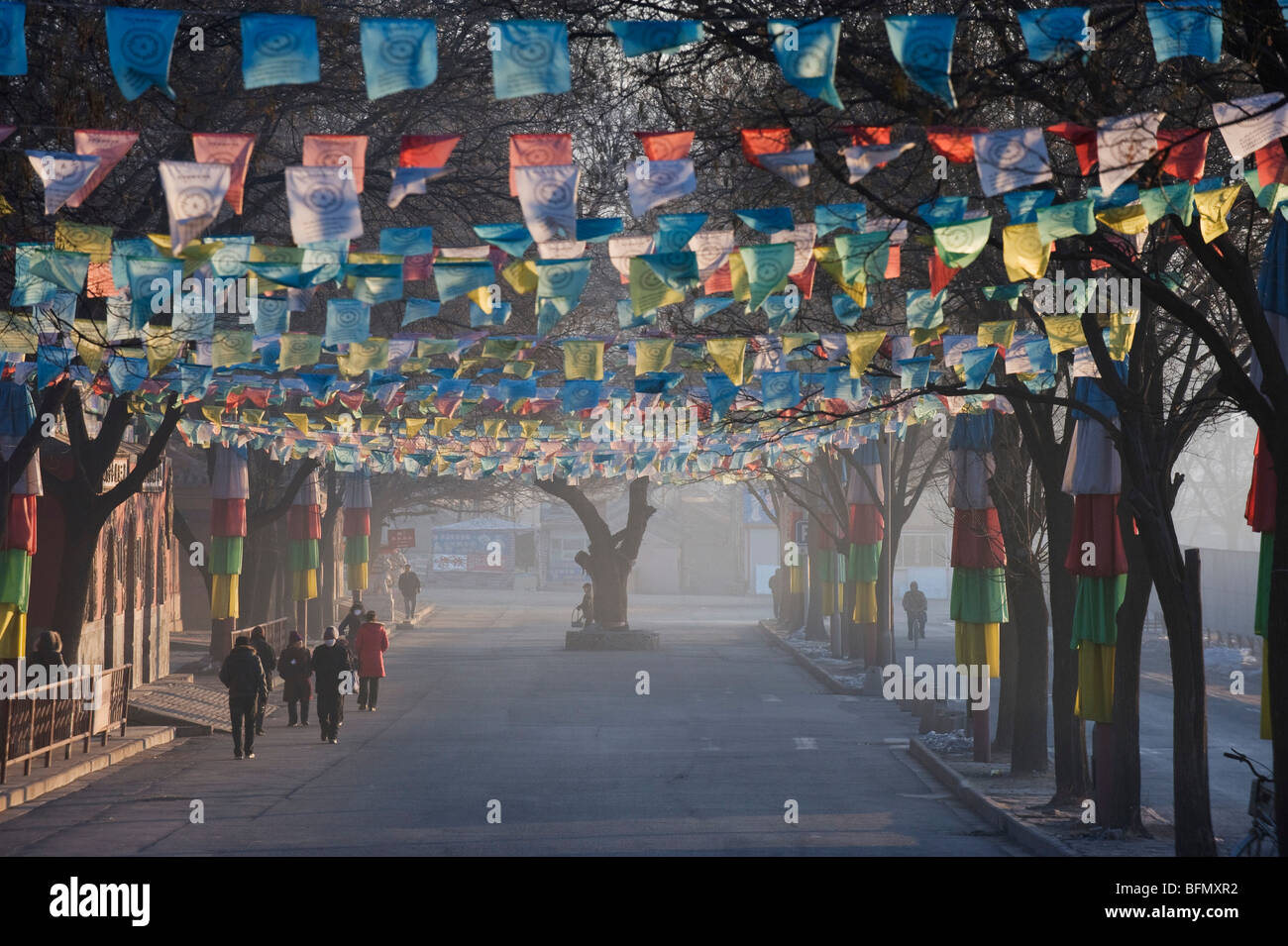 China, Hebei Province, Chengde, Tibetan prayer flags lining a street Stock Photo