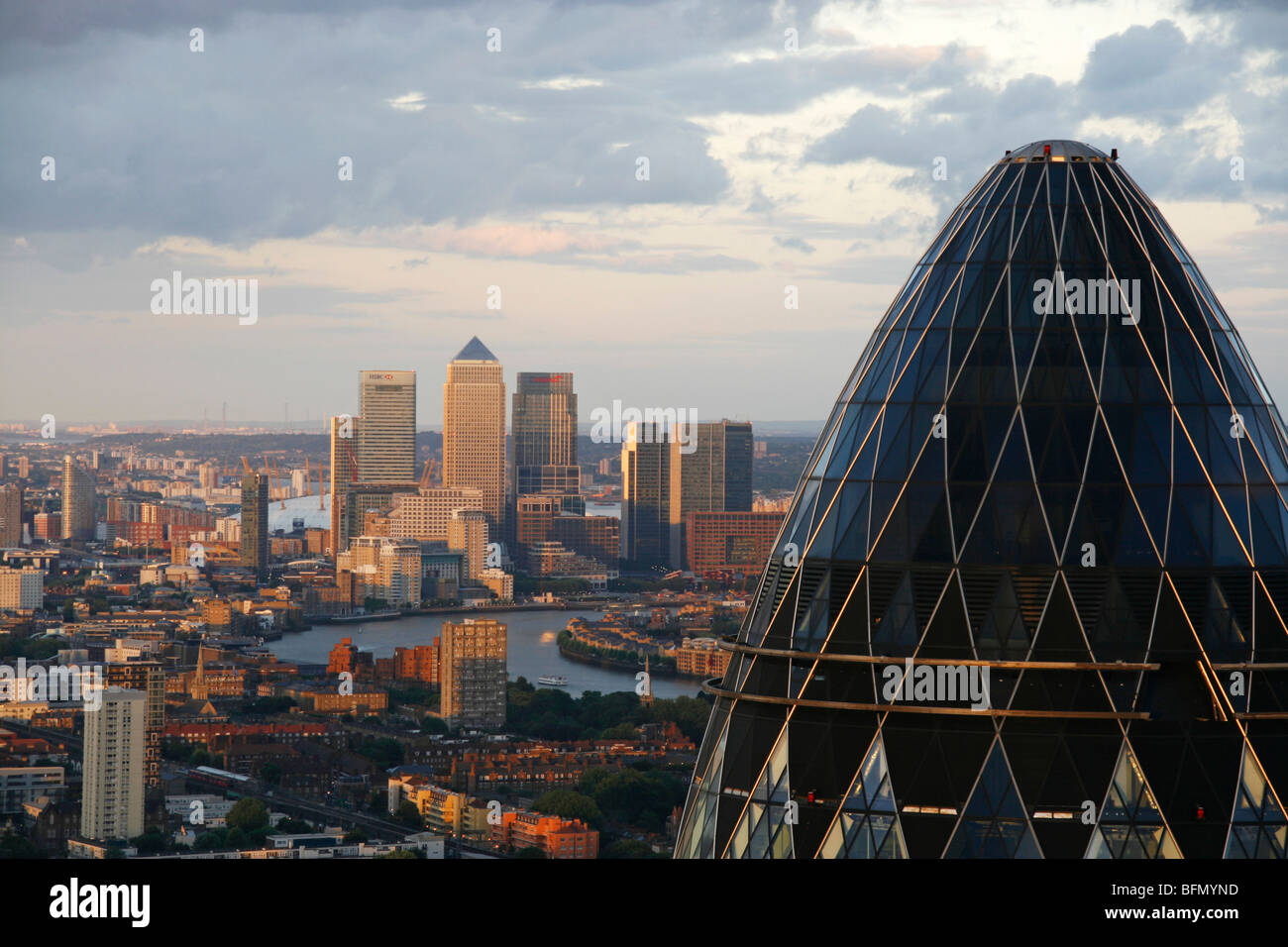England, London. View on Canary Wharf from the Tower 42 with the Gherkin in the foreground. Stock Photo