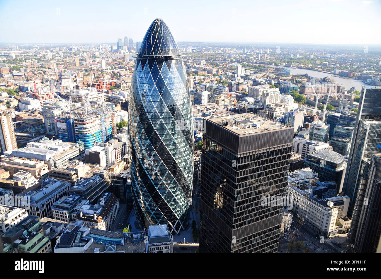 The Swiss Re Building (The Gherkin) at 30 St Mary Axe in The City of London, designed by Sir Norman Foster. Stock Photo