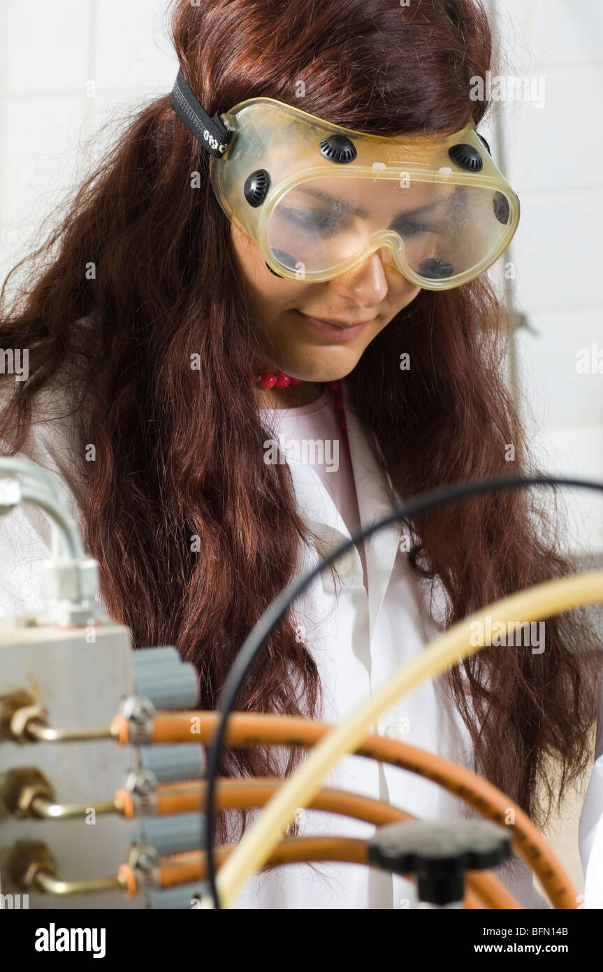 Close up of a young pharmacy student wearing safety goggles working inside lab at Beirut Arab University Lebanon Middle East Stock Photo