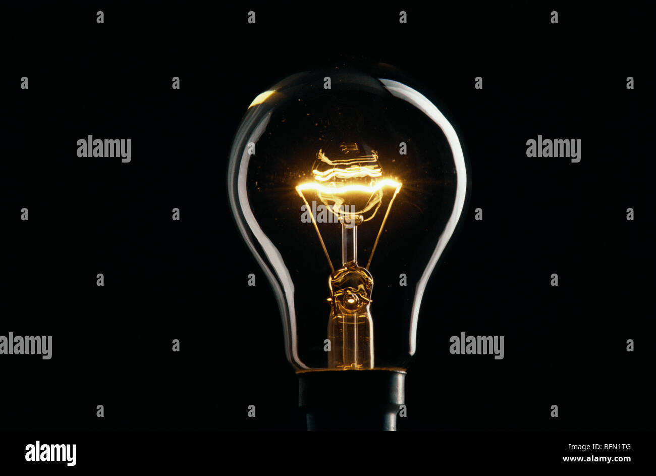 electric light ; incandescent light bulb wire filament glowing ; india ;  asia Stock Photo - Alamy