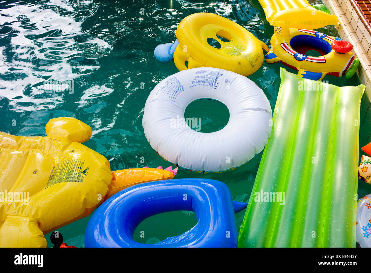 Inflatables in a pool Stock Photo Alamy
