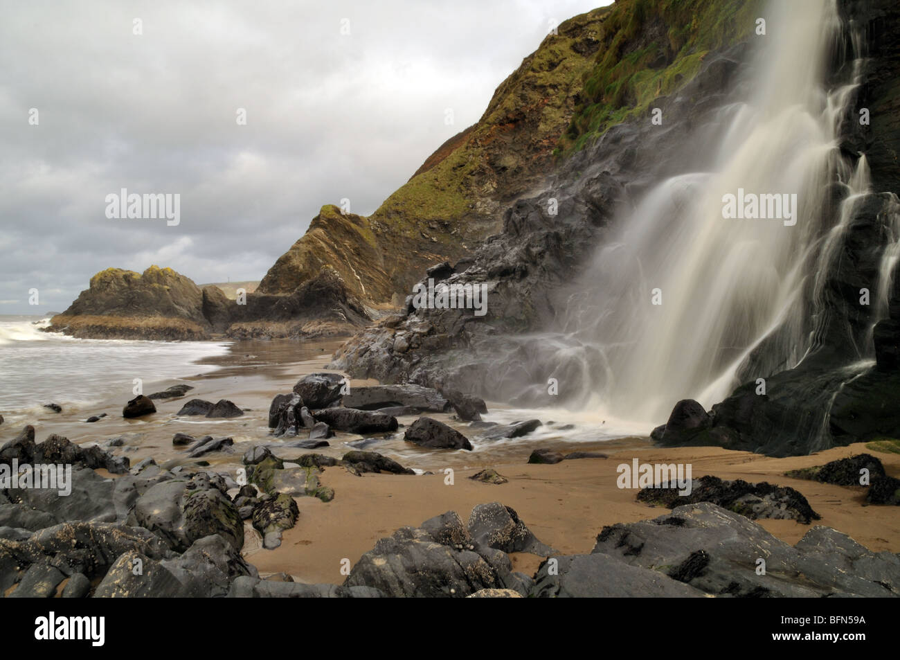 Cliff waterfall aberporth cardigan bay hires stock photography and