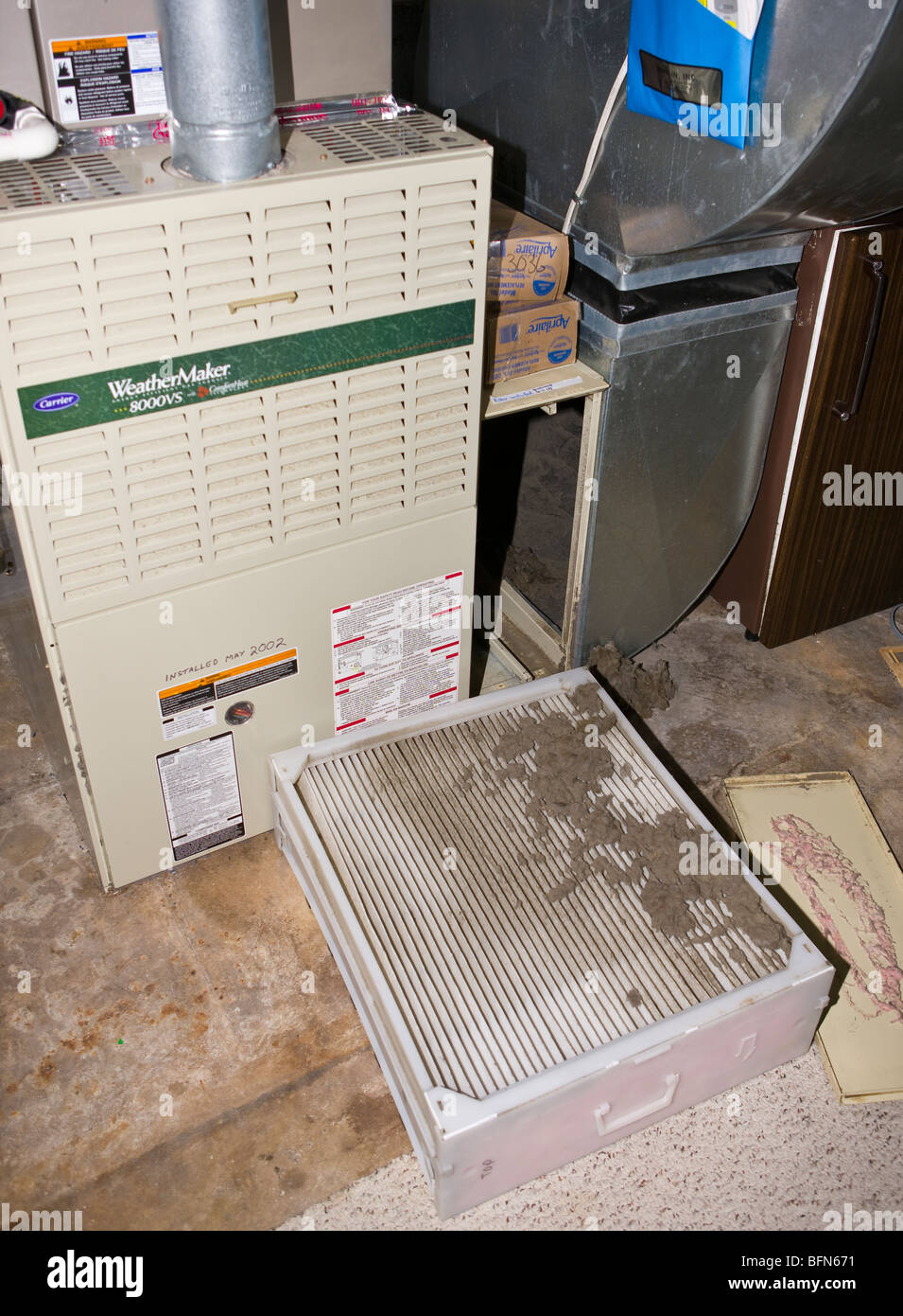 ARLINGTON, VIRGINIA, USA - Dirty air filter on home furnace. Stock Photo