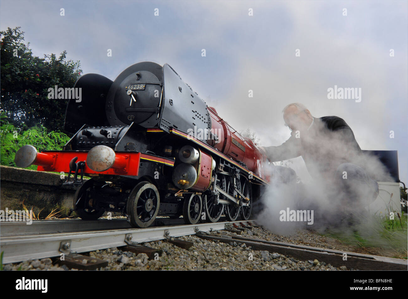 A model railway enthusiast with a hand built steam model of a Stanier