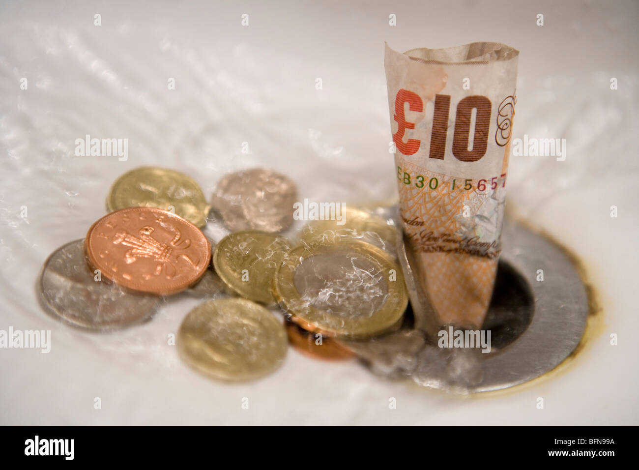 English Money Going Down The Drain Stock Photo 26898518 Alamy - 