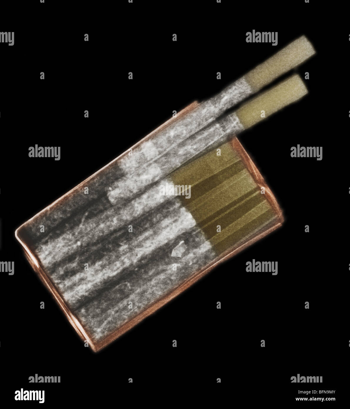 color enhanced x-ray of a pack of cigarettes Stock Photo