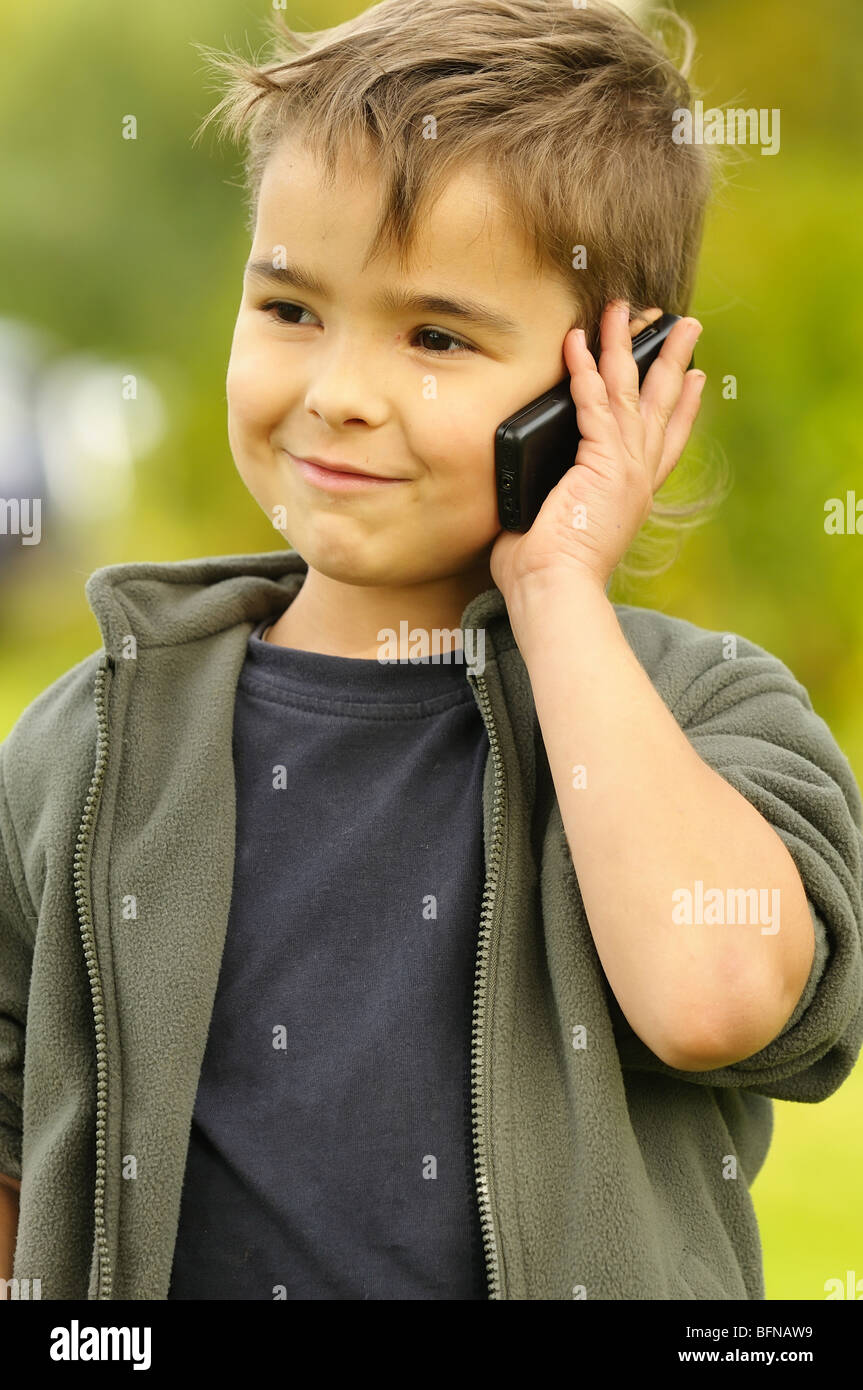 boy talking on a mobile phone Stock Photo