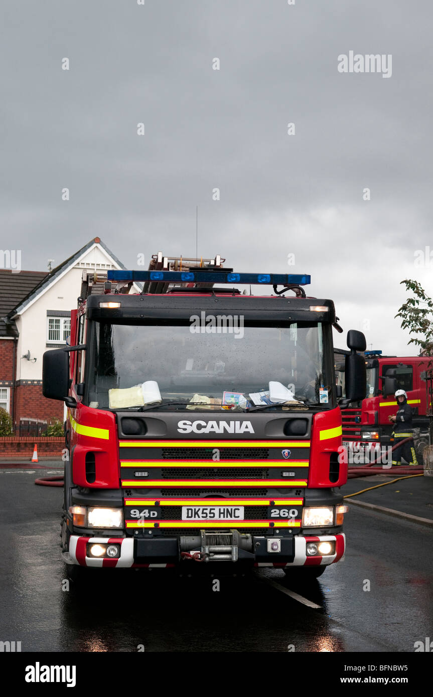 Scania Fire Engine on wet road portrait format Stock Photo