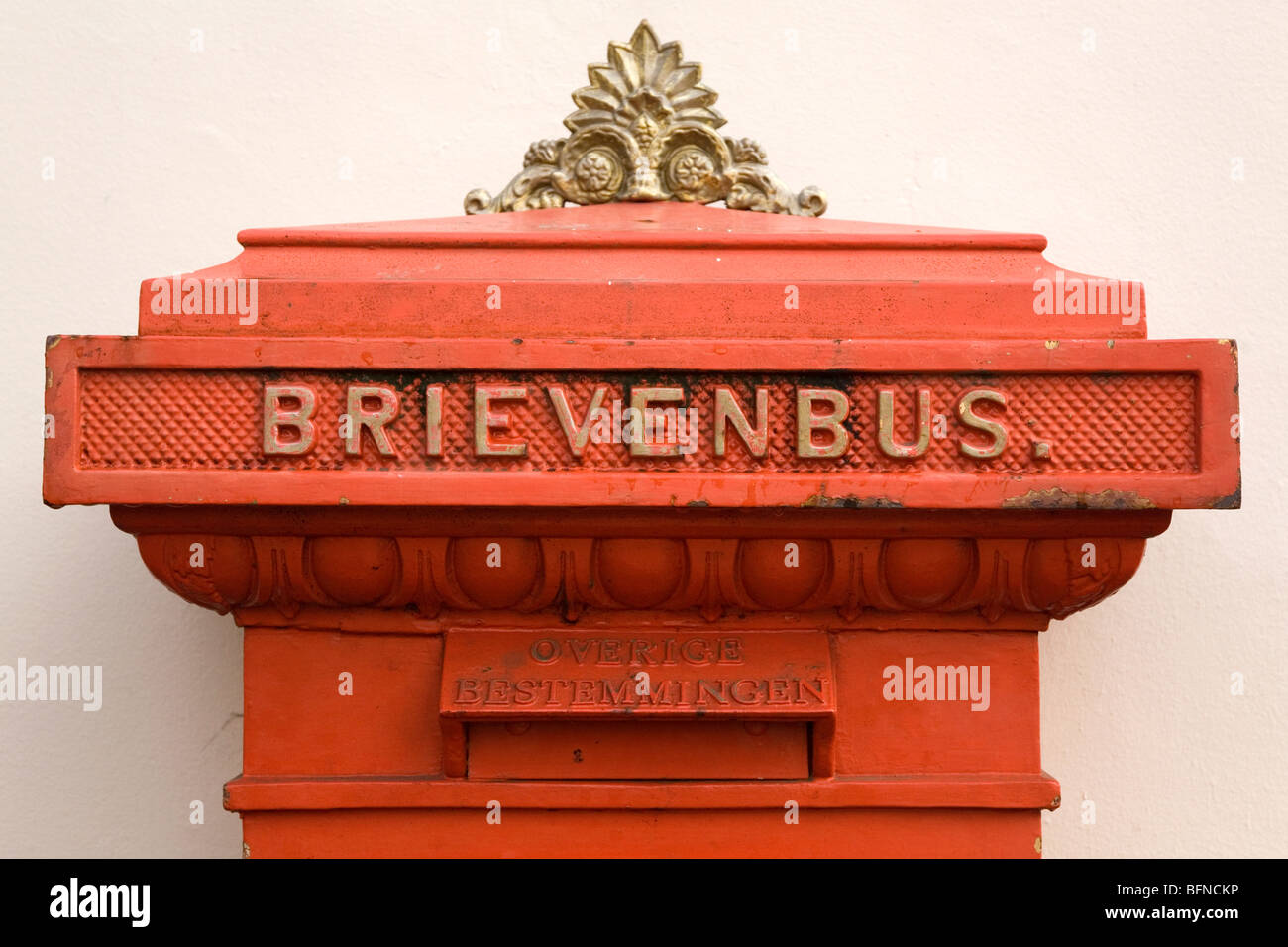 A red post box in the Dutch city of Breda. The word "Brievenbus" can be  seen on the post box Stock Photo - Alamy