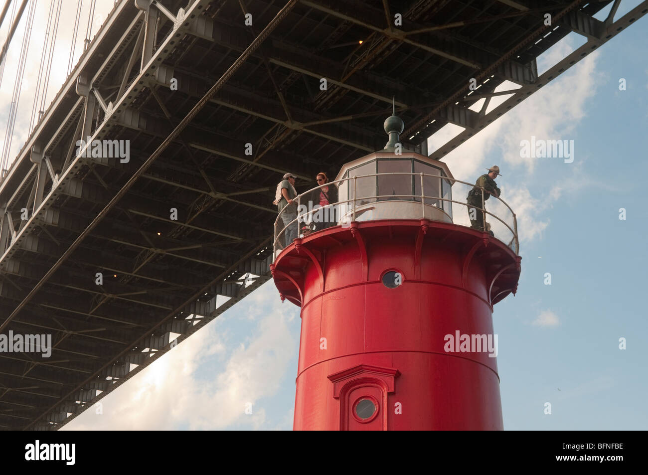Visitors atop the little Red Lighthouse Stock Photo