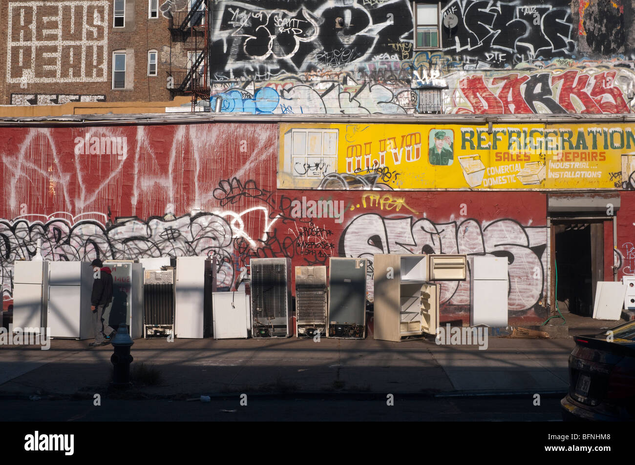 Brooklyn, NY 18 November 2009 - Used Refrigerators and Graffiti on South 5th Street in Williamsburg Stock Photo