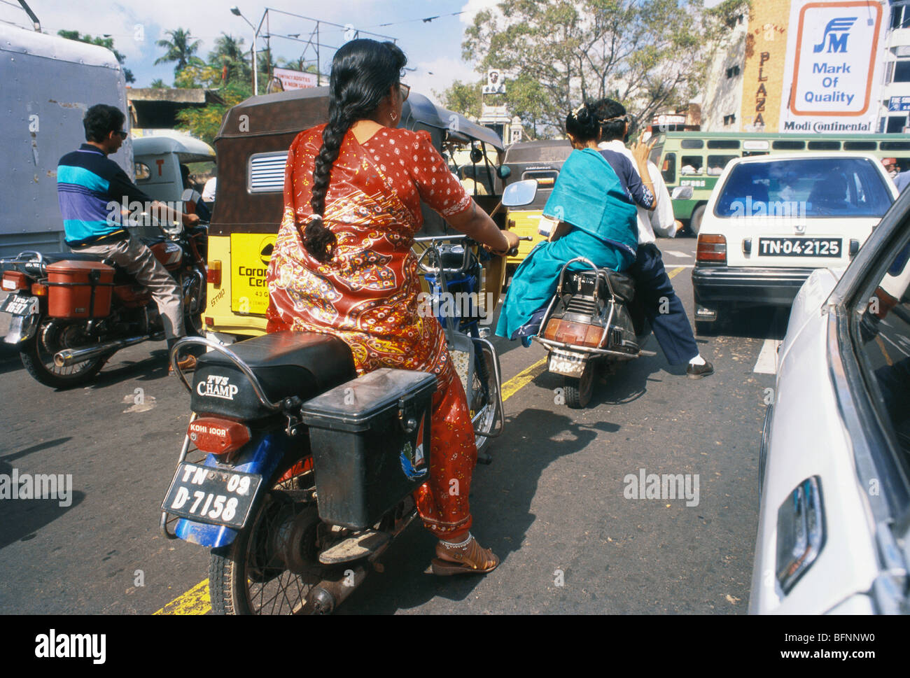 HMA 62606 Woman riding a bike ; Chennai Madras ; Tamil Nadu ; India