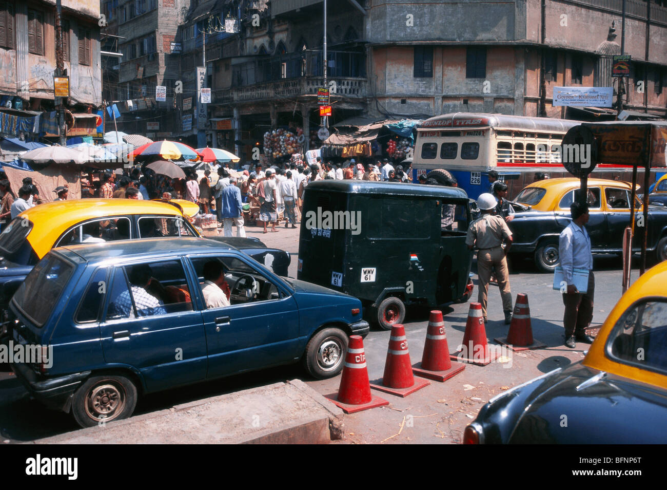 Road traffic bada bazaar Calcutta Kolkata West Bengal India Stock Photo