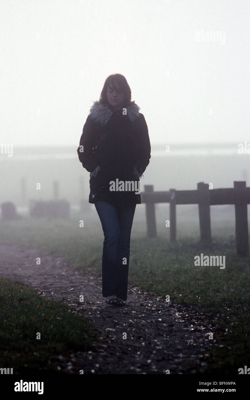 Sad Girl Walking In The Rain