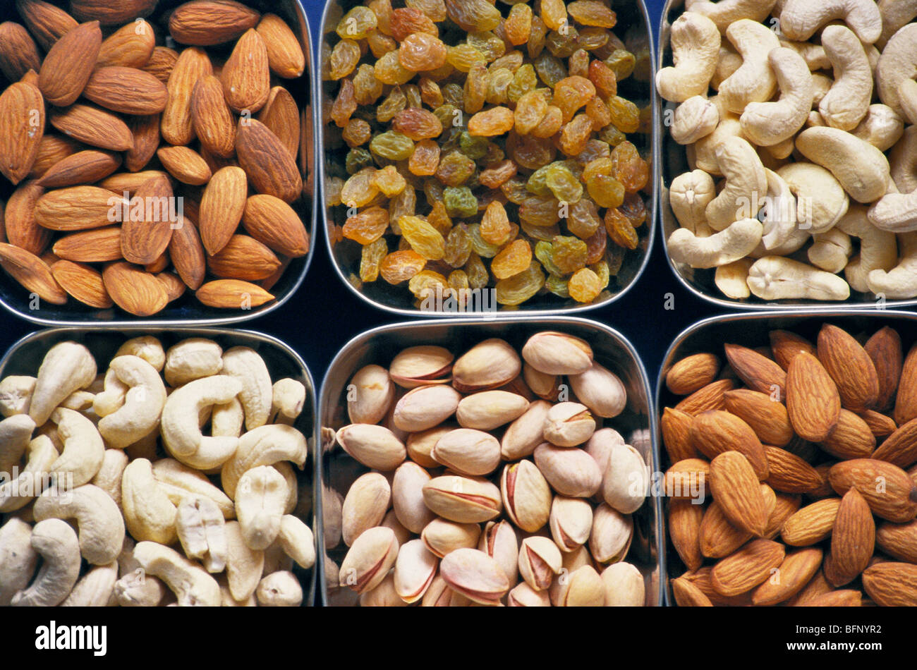 Dry fruit box ; cashew nuts ; almonds ; pistachio ; raisins ; Diwali festival ; Bombay ; Mumbai ; maharashtra ; india ; asia Stock Photo
