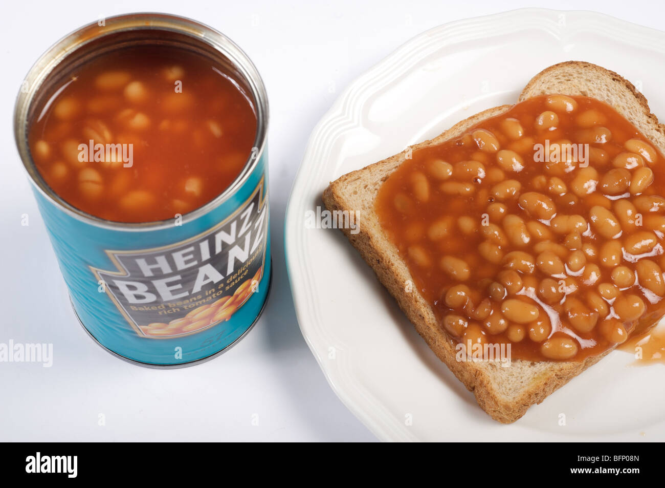 Heinz baked beans on toast, a traditional snack food in Great Britain Stock Photo