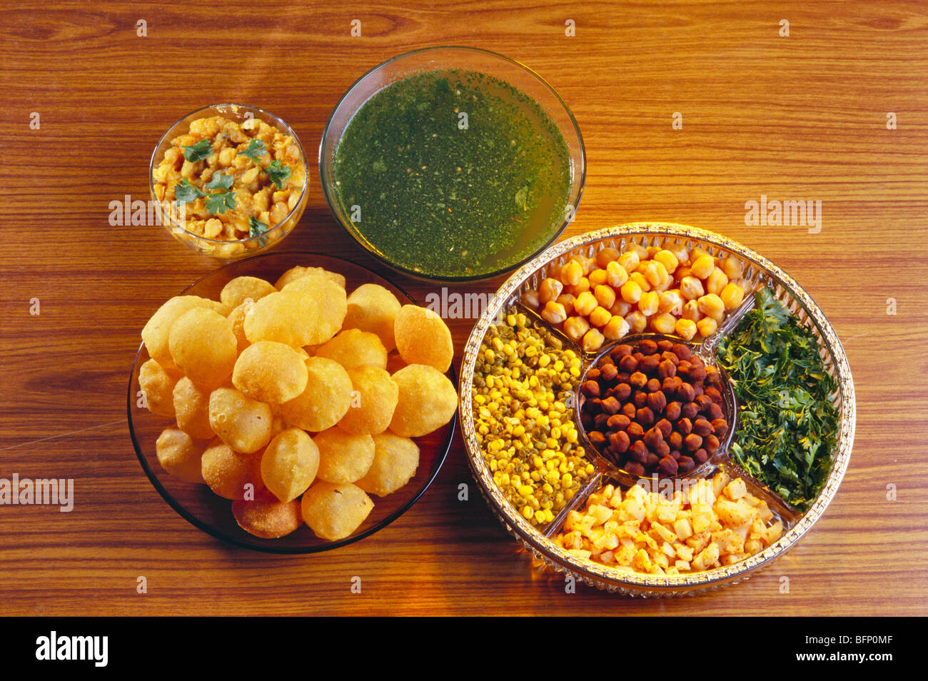 Panipuri with ragda ; chana ; moong ; potatoes and coriander leaves