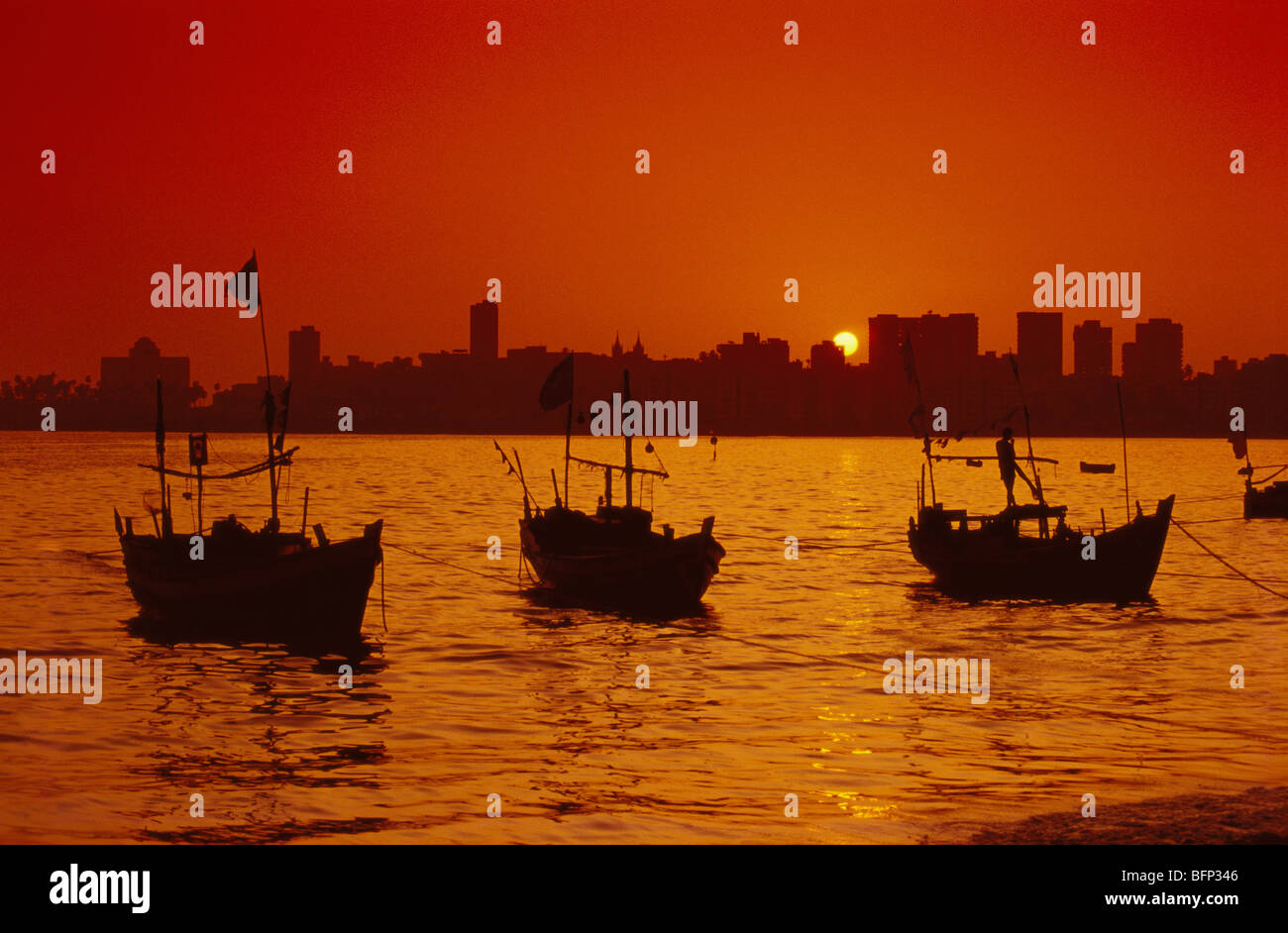 Fishing boats at sunset ; Mahim ; Bombay ; Mumbai ; Maharashtra ; India ; asia Stock Photo