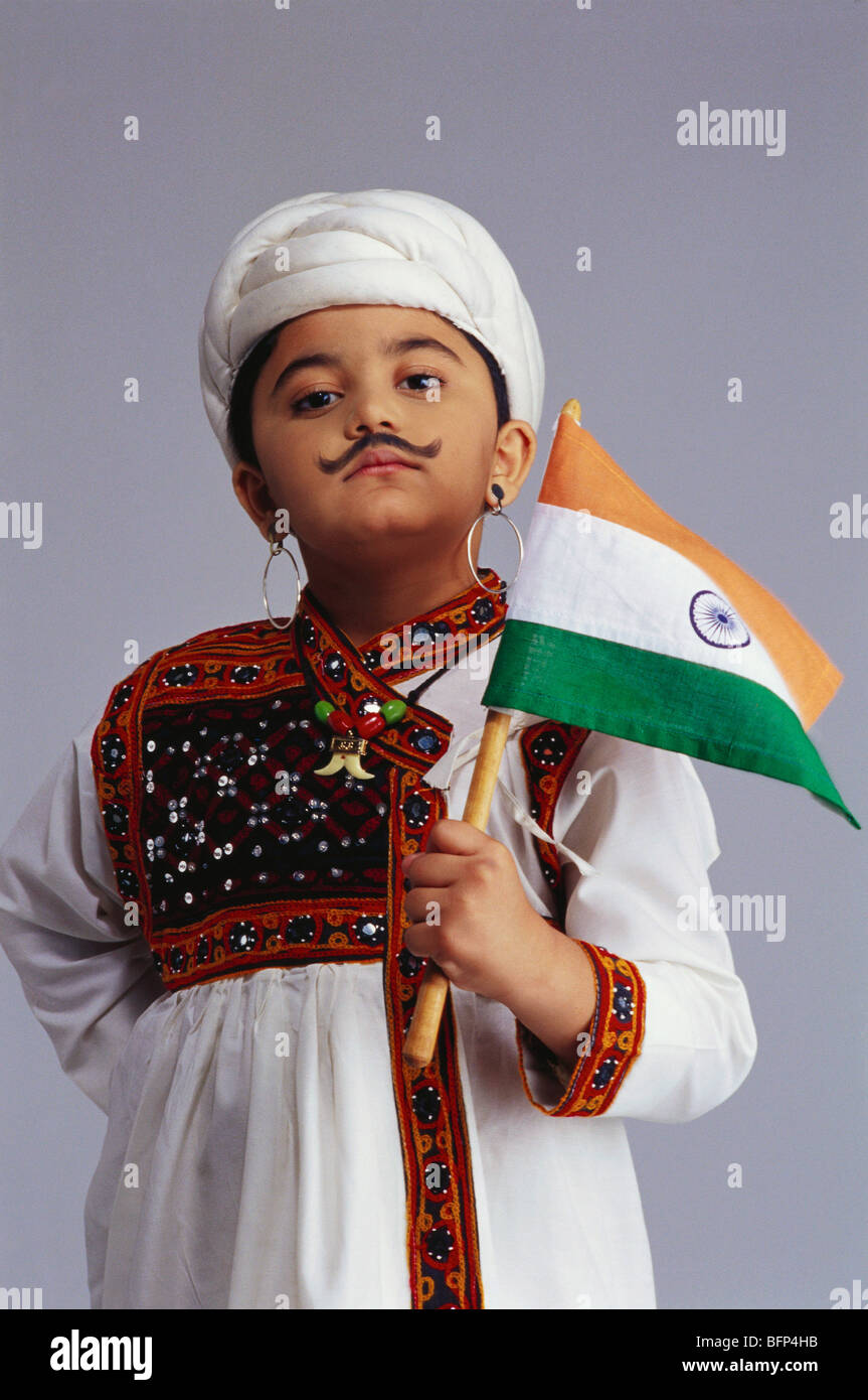 VDA 63632 : Boy dressed as Gujarati holding flag of India MR#498 Stock Photo