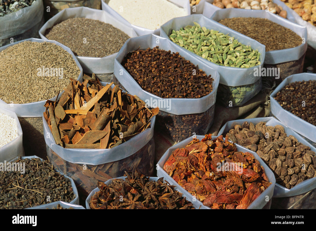Spices sale display cardamom cloves coriander cumin seed cinnamon black