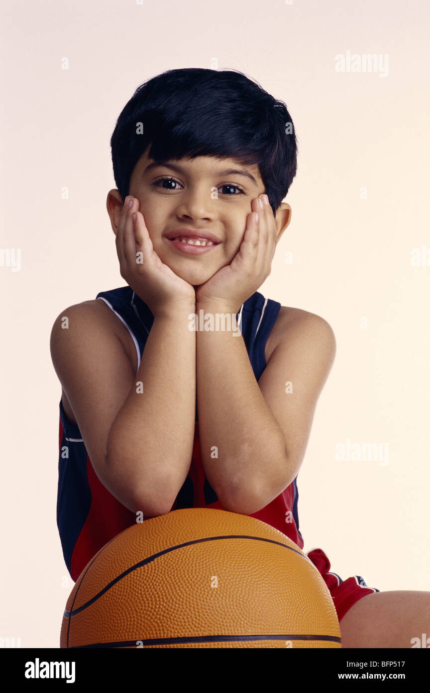 Indian child boy in fancy dress costume of basketball player with basket  ball ; India ; Asia ; MR#499 Stock Photo - Alamy