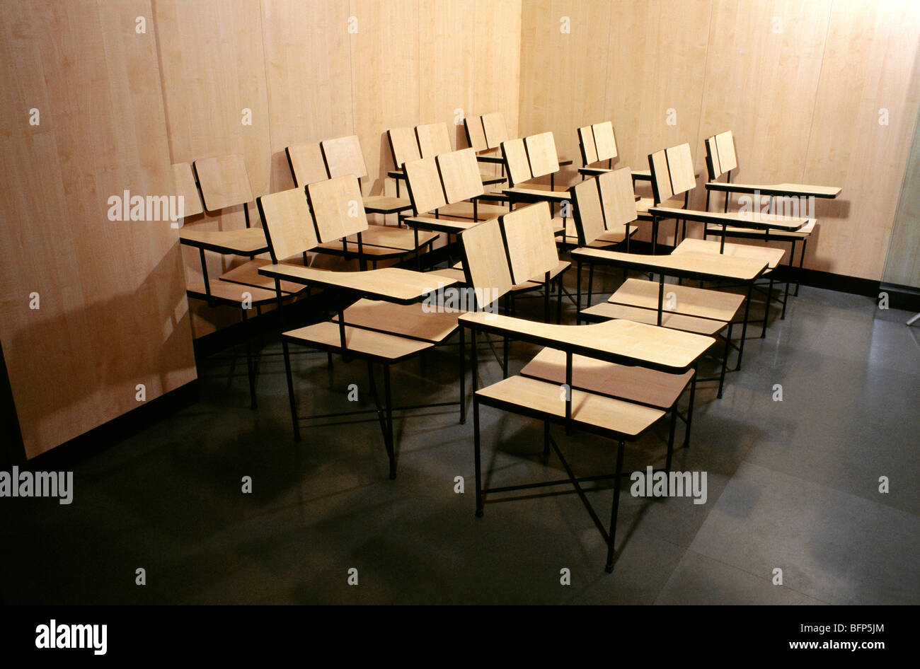 Empty tables and chairs in class Stock Photo Alamy