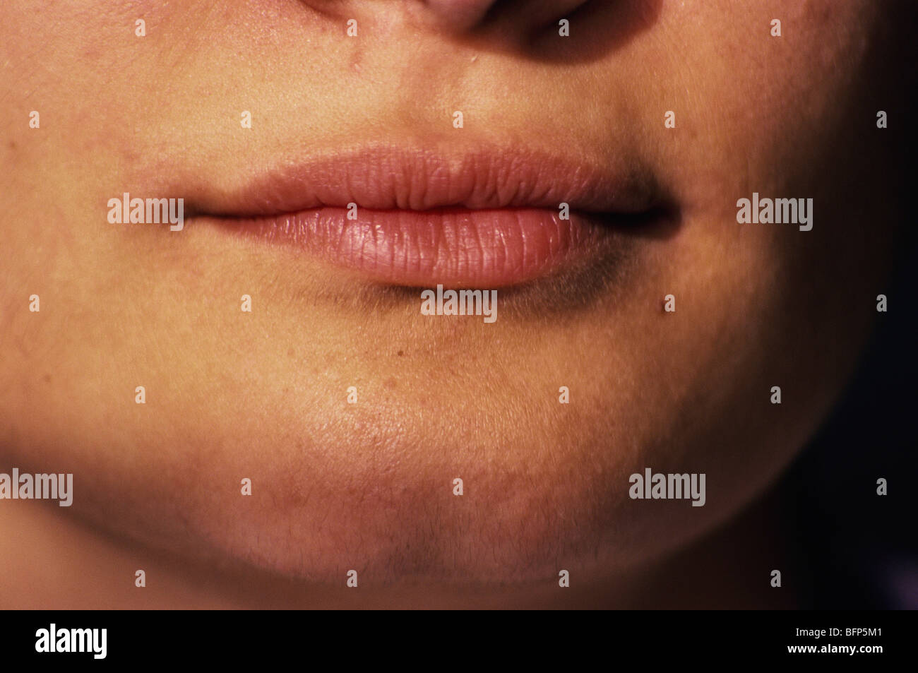 Lips of teenager woman MR Stock Photo