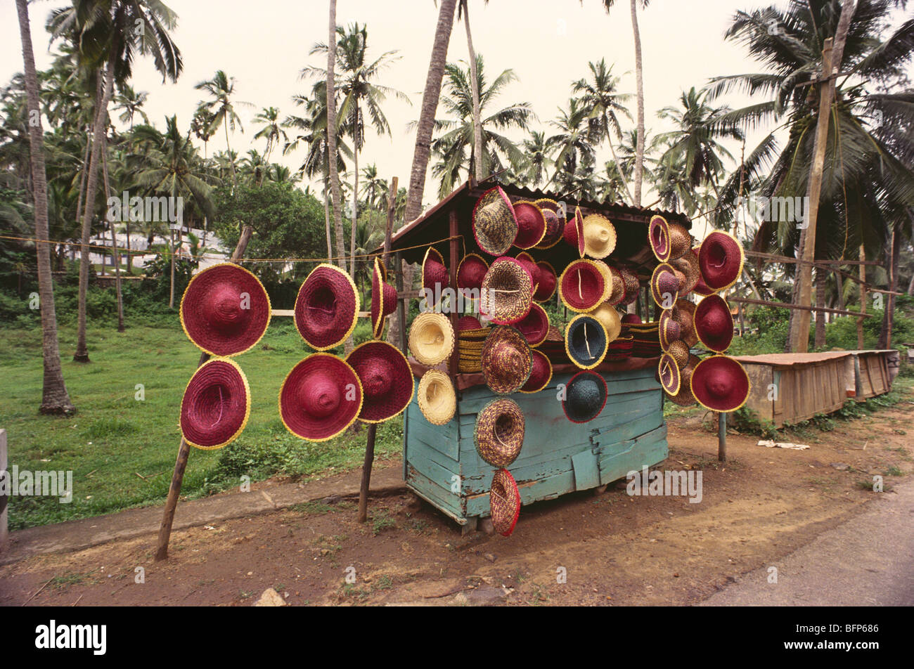 Cane hats for sale ; Kovalam beach ; Kerala ; India ; asia Stock Photo