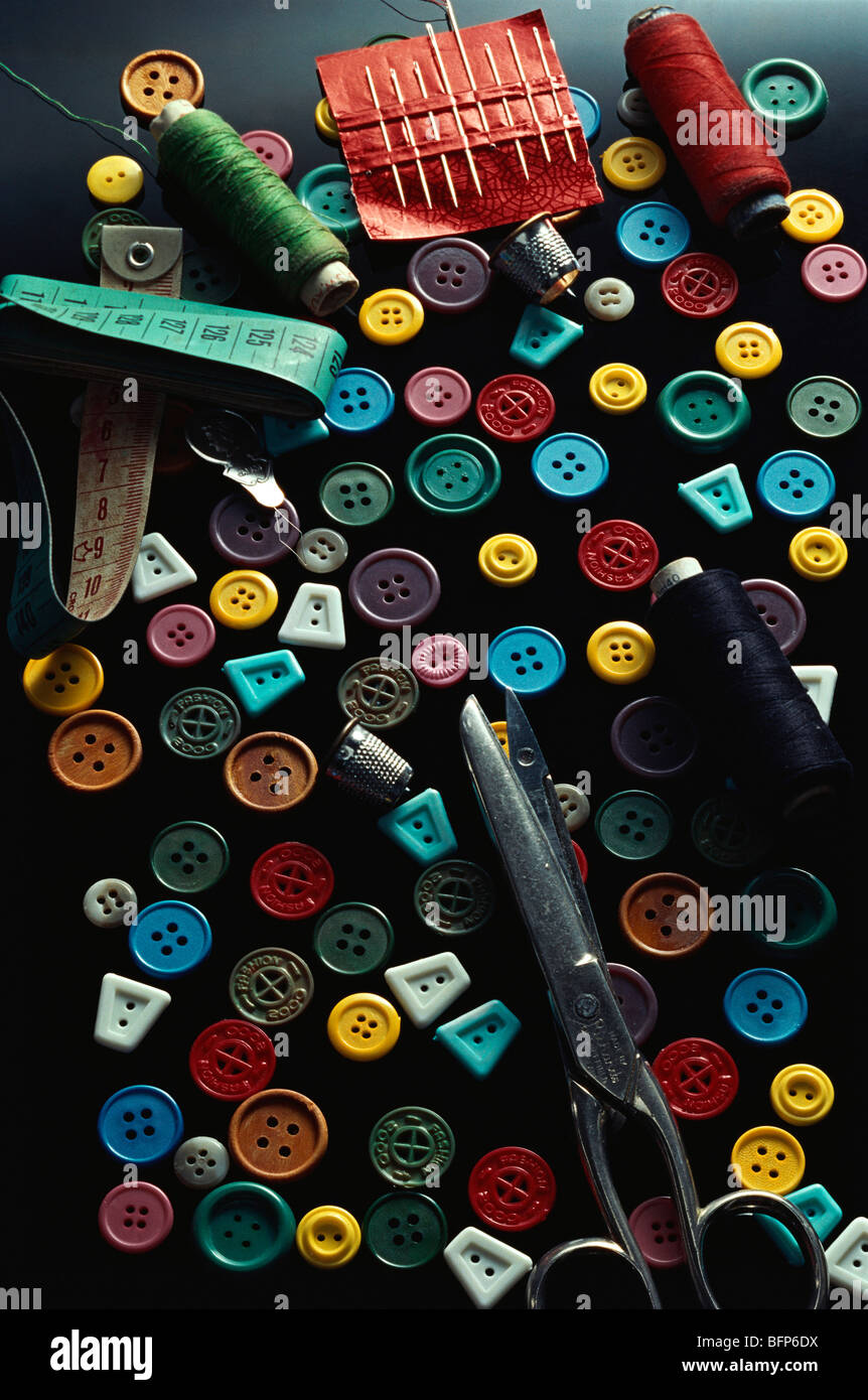 Tailor products buttons scissor tape Stock Photo - Alamy