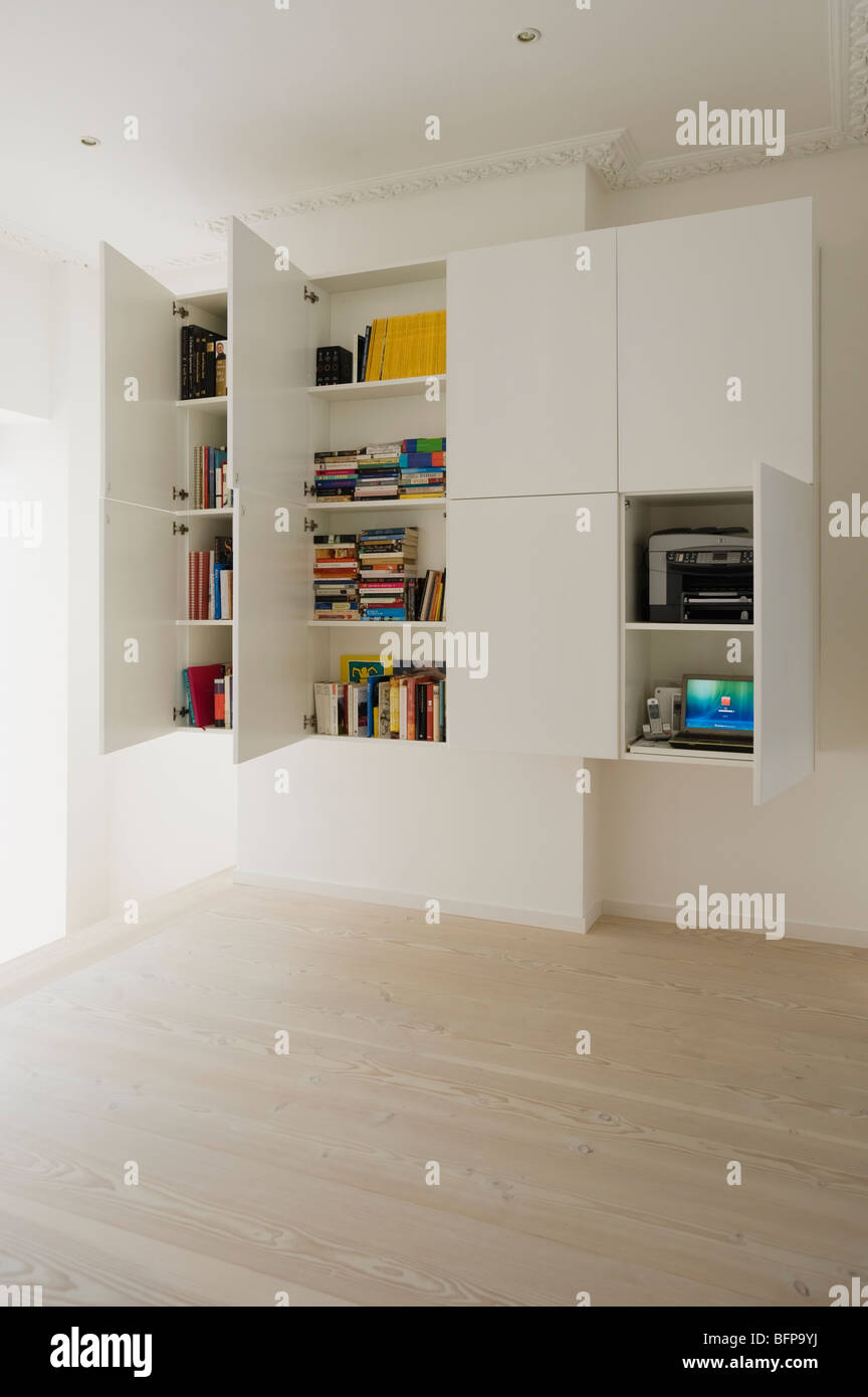 Wall mounted concealed storage unit Stock Photo Alamy