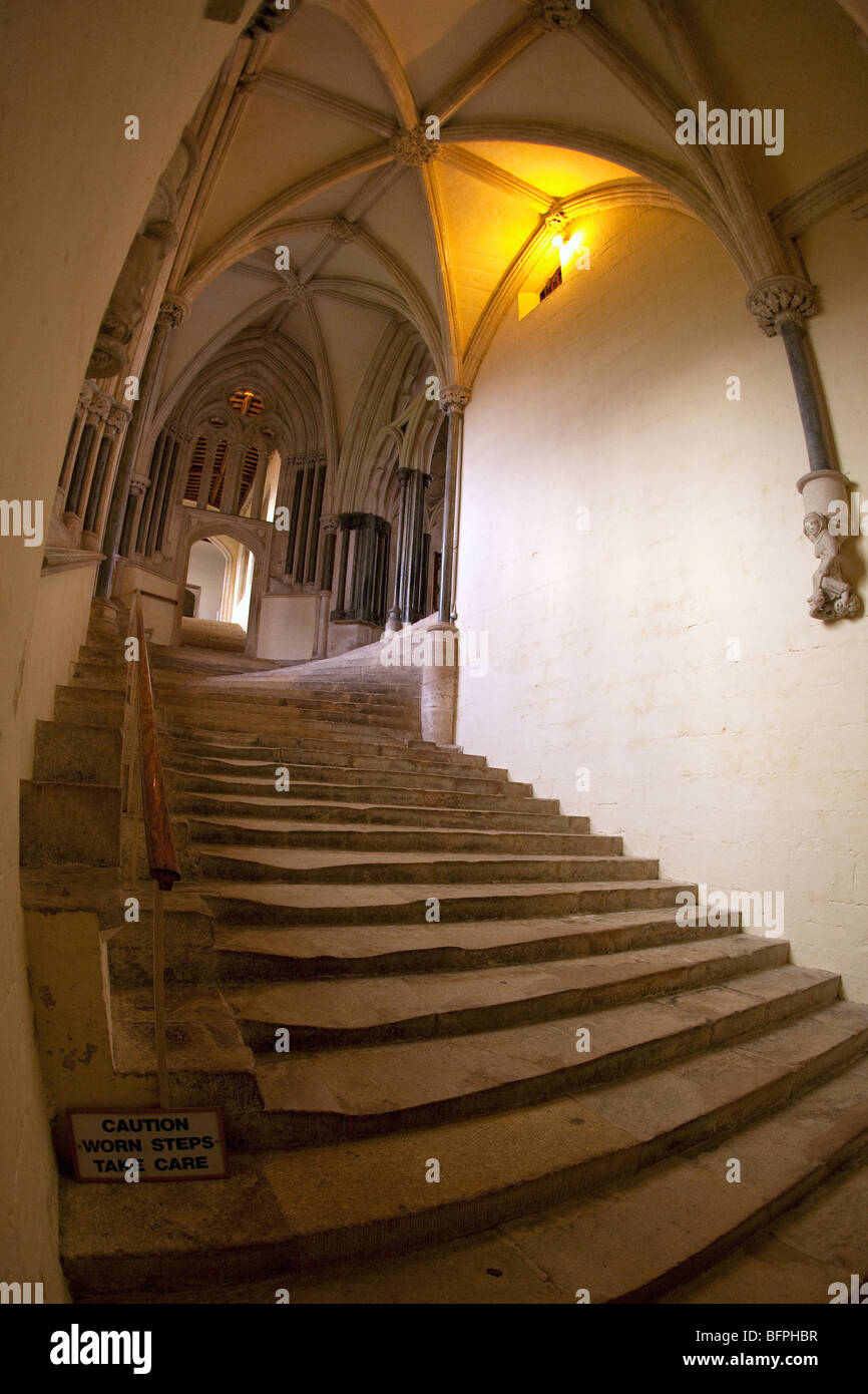 Worn steps stairs staircase Chapter House interior 14th century Wells Cathedral Somerset England UK United Kingdom GB Stock Photo