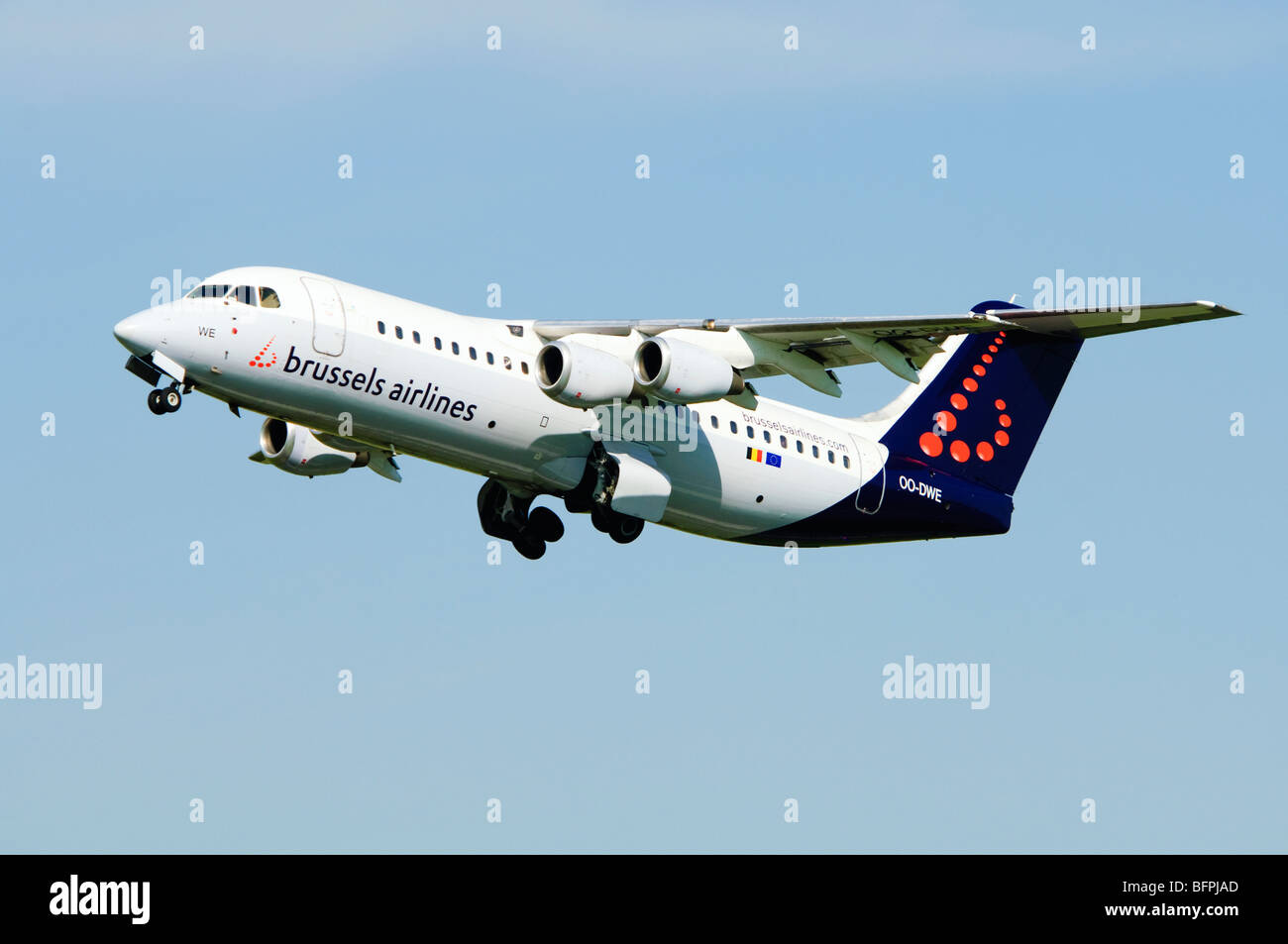 Avro RJ100 operated by Brussels Airlines climbing out from taking off at Birmingham Airport, UK. Stock Photo