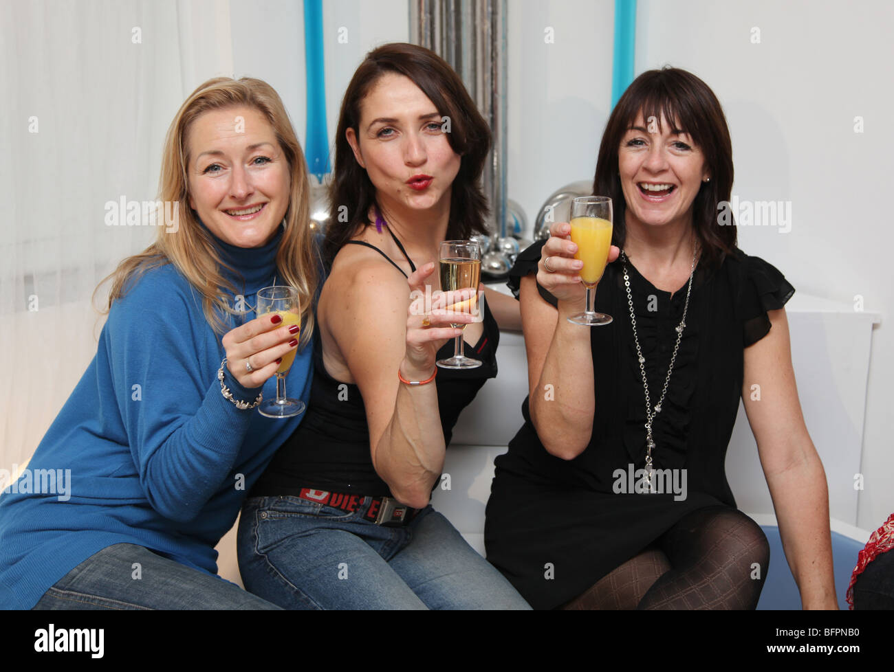 Ladies out drinking after work Stock Photo Alamy