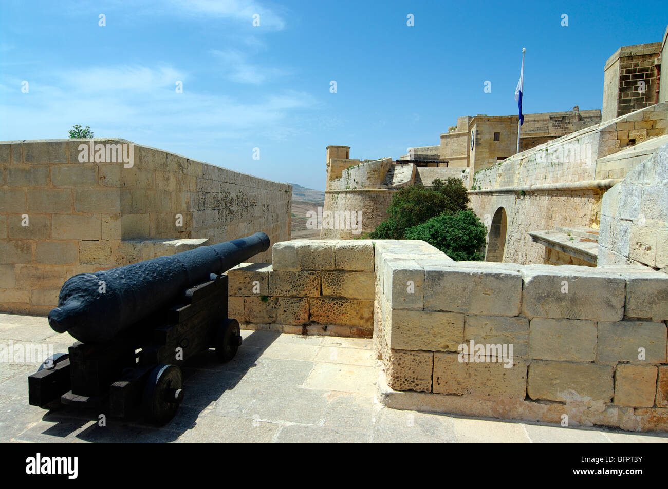 Old cannon overlooking the entrance to the Citadel, Gozo, Malta. Stock Photo
