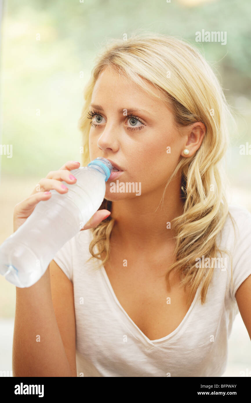 Teenage Girl Drinking Bottled Water. Model Released Stock Photo Alamy