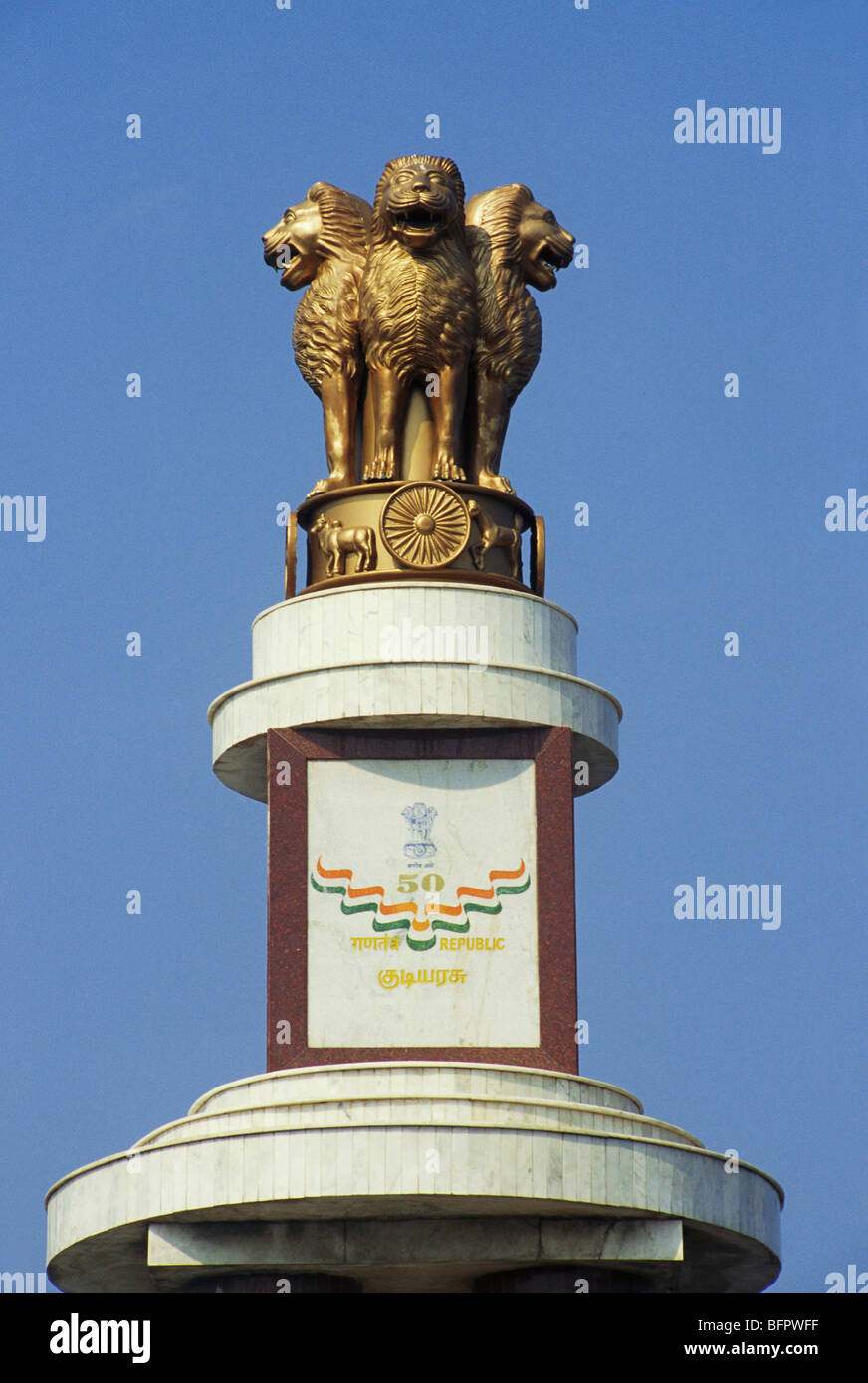 NMK 66454 : Ashok Stambha four lion heads in gold paint ; Marina ; Chennai ; Tamil Nadu ; India Stock Photo