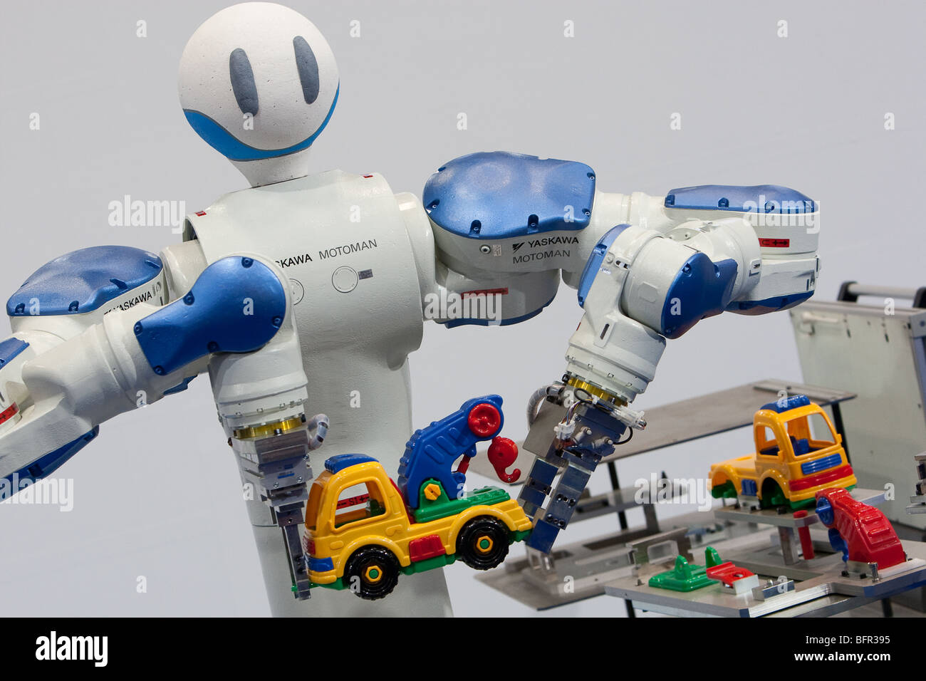 Motoman' robots produced by Yaskawa, at the International Robot Exhibition  2009, in Tokyo, Japan Stock Photo - Alamy
