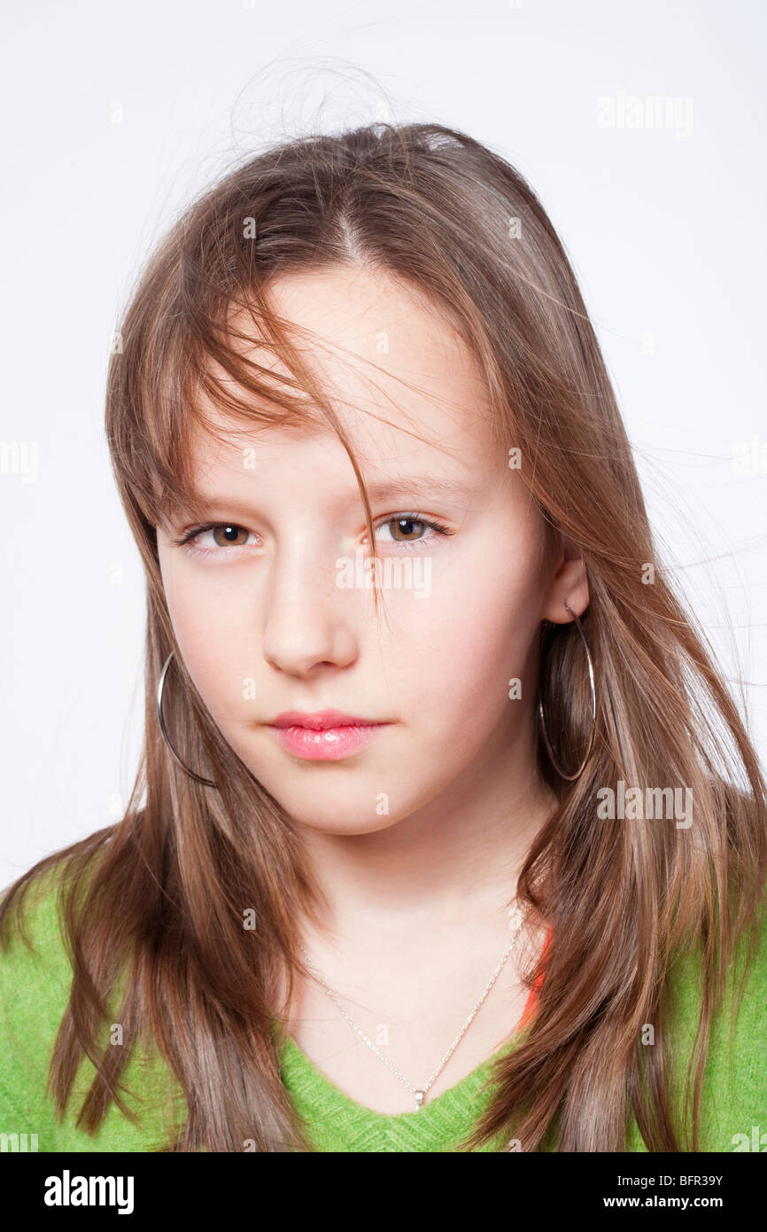 studio portrait of a pretty, eleven years old girl Stock Photo Alamy
