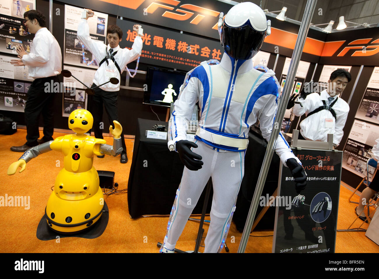 Various robots including 'Wakamaru', on display at the International