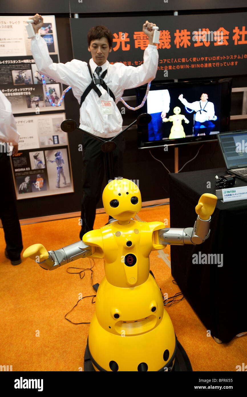 Various robots including 'Wakamaru', on display at the International