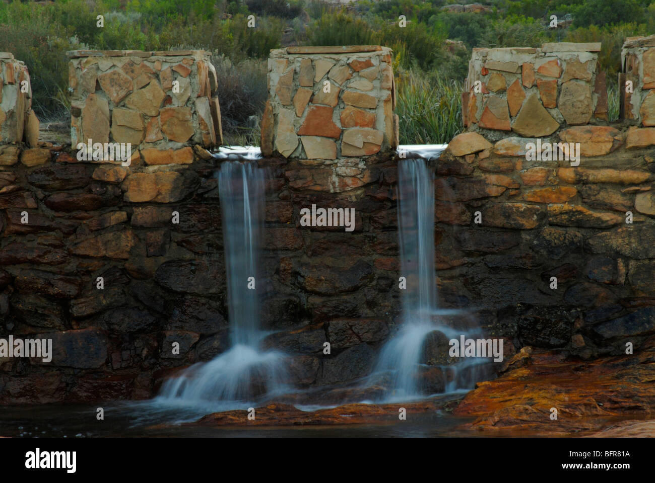 Waterfall on weir Stock Photo