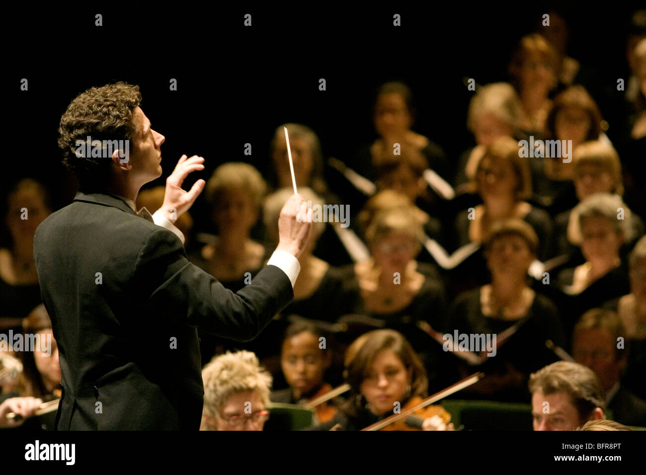 Jeffrey Douma conducting the Johannesburg Festival Orchestra in the performance of the Creation by Joseph Haydn Stock Photo