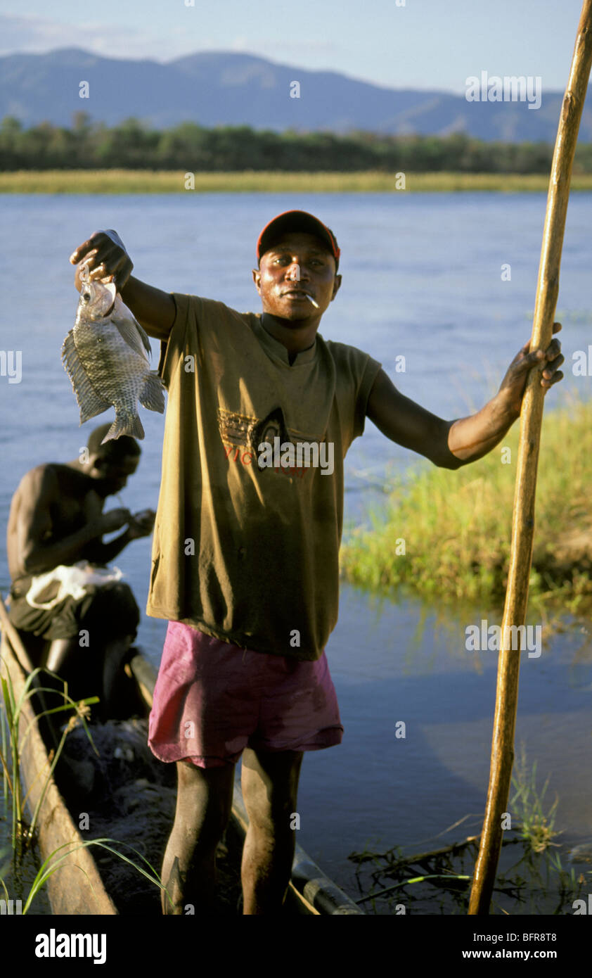 Fisherman boat holding fish hi-res stock photography and images - Alamy