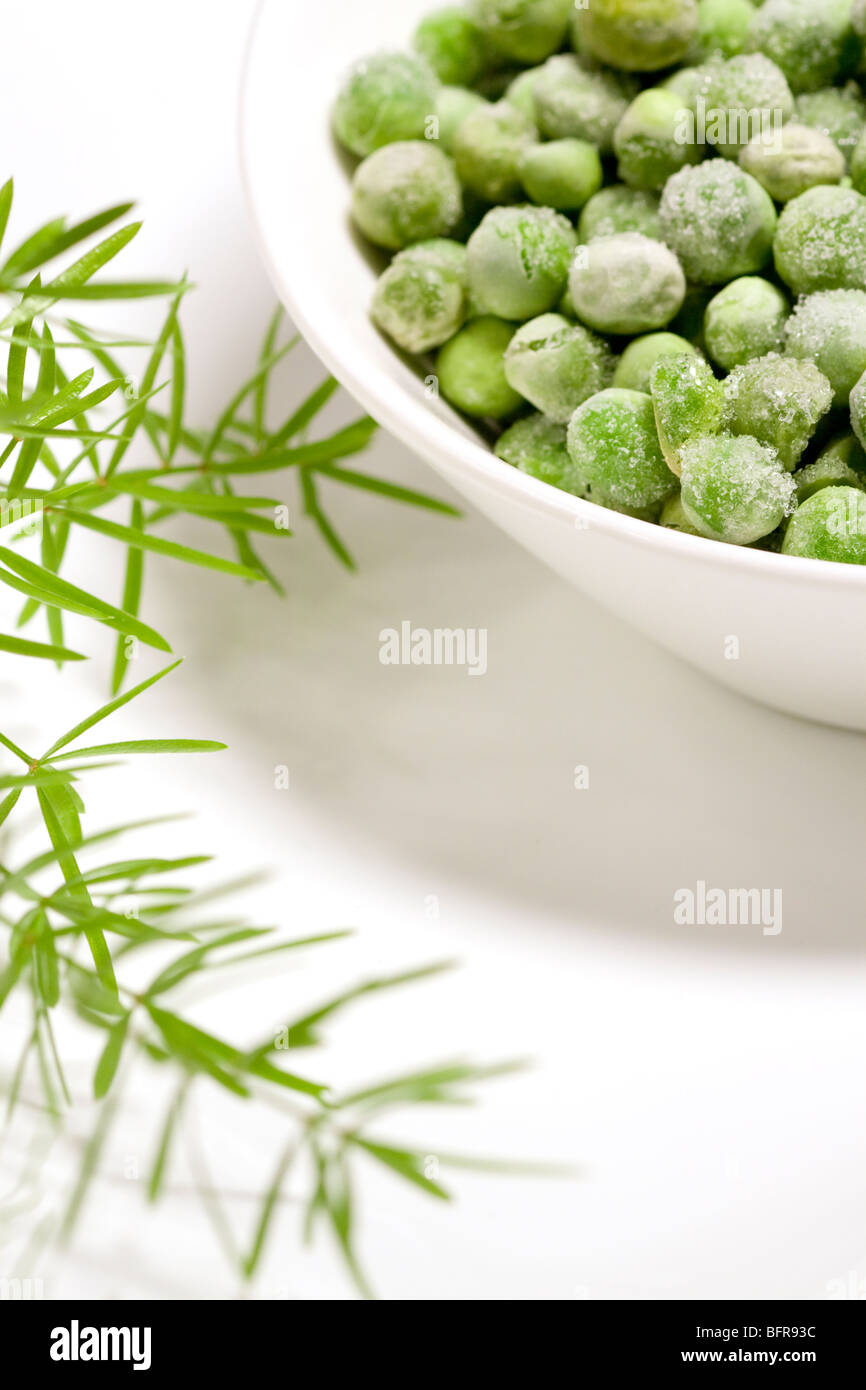 Closeup of green peas and herbs Stock Photo