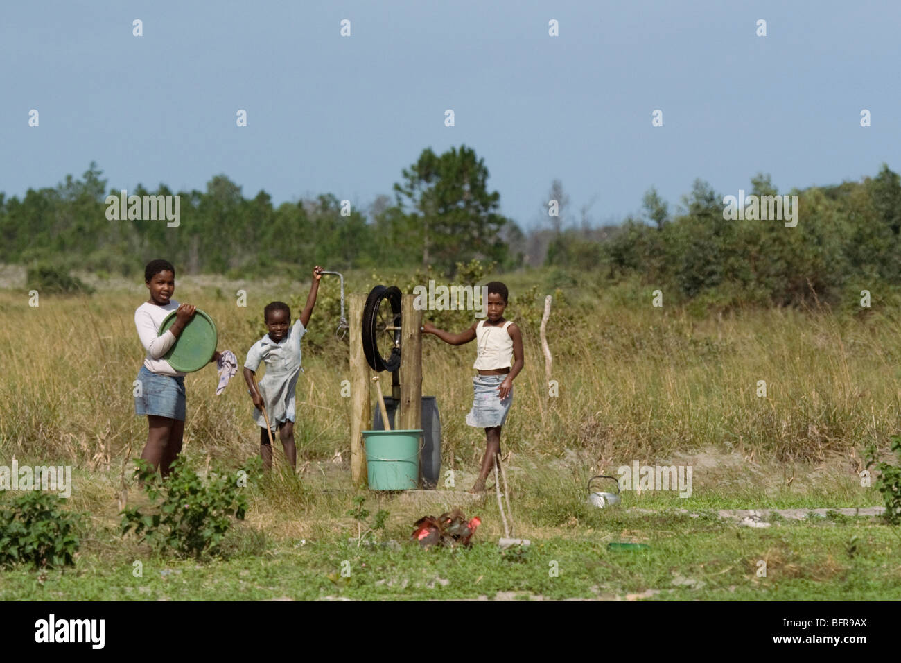 Zulu girls collecting water Stock Photo