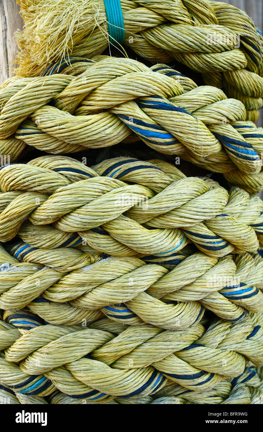 Close up of a heavy rope mooring a fishing boat. Stock Photo