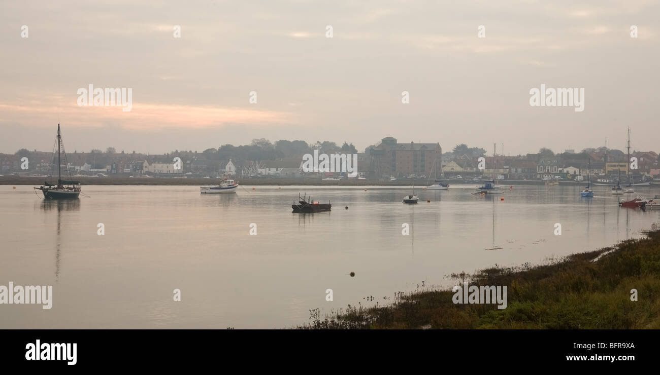 Wells next the Sea main channel and harbour on misty autumn morning Stock Photo
